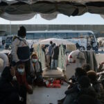 Hundreds of rescued migrants arrive in Italy