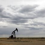 Oil drops below $100