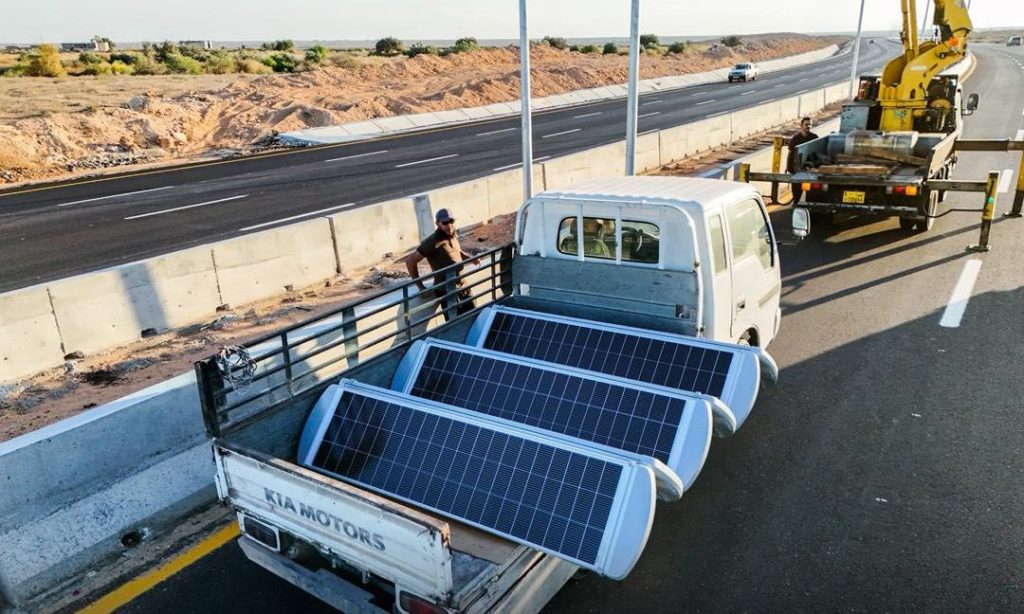 Work begins on installing lighting poles on the international road in Sirte