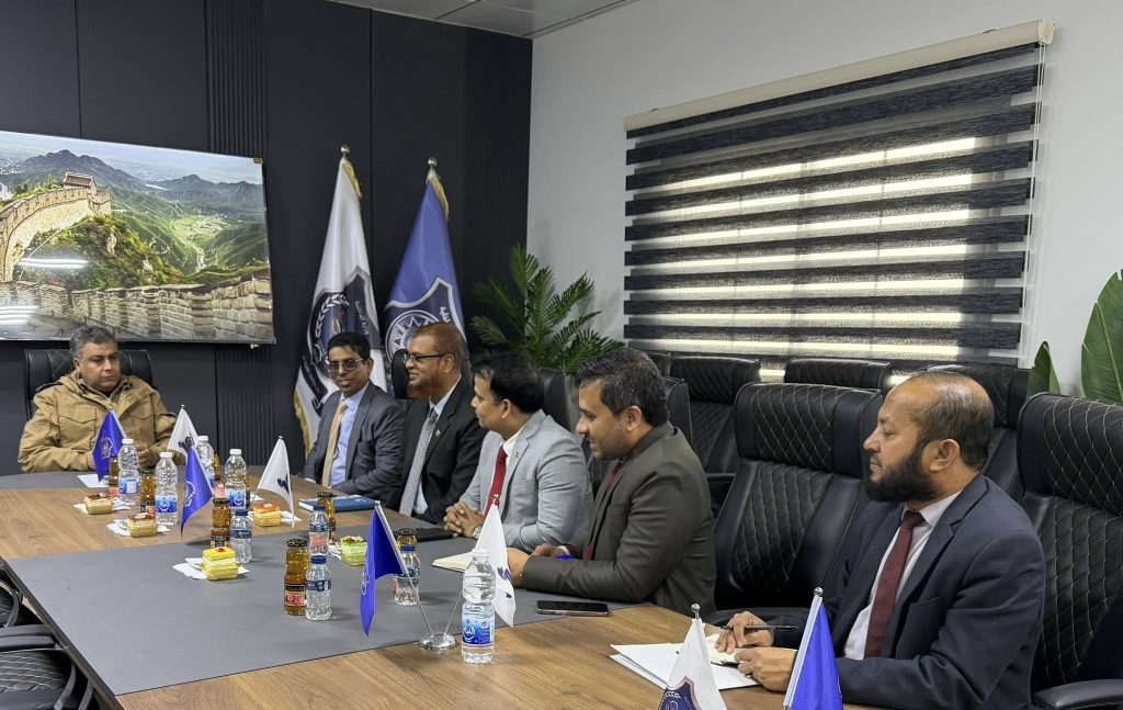 The Bangladeshi Chargé d'Affaires to Libya inspects the conditions of his country's illegal migrants at a shelter center east of Tripoli
